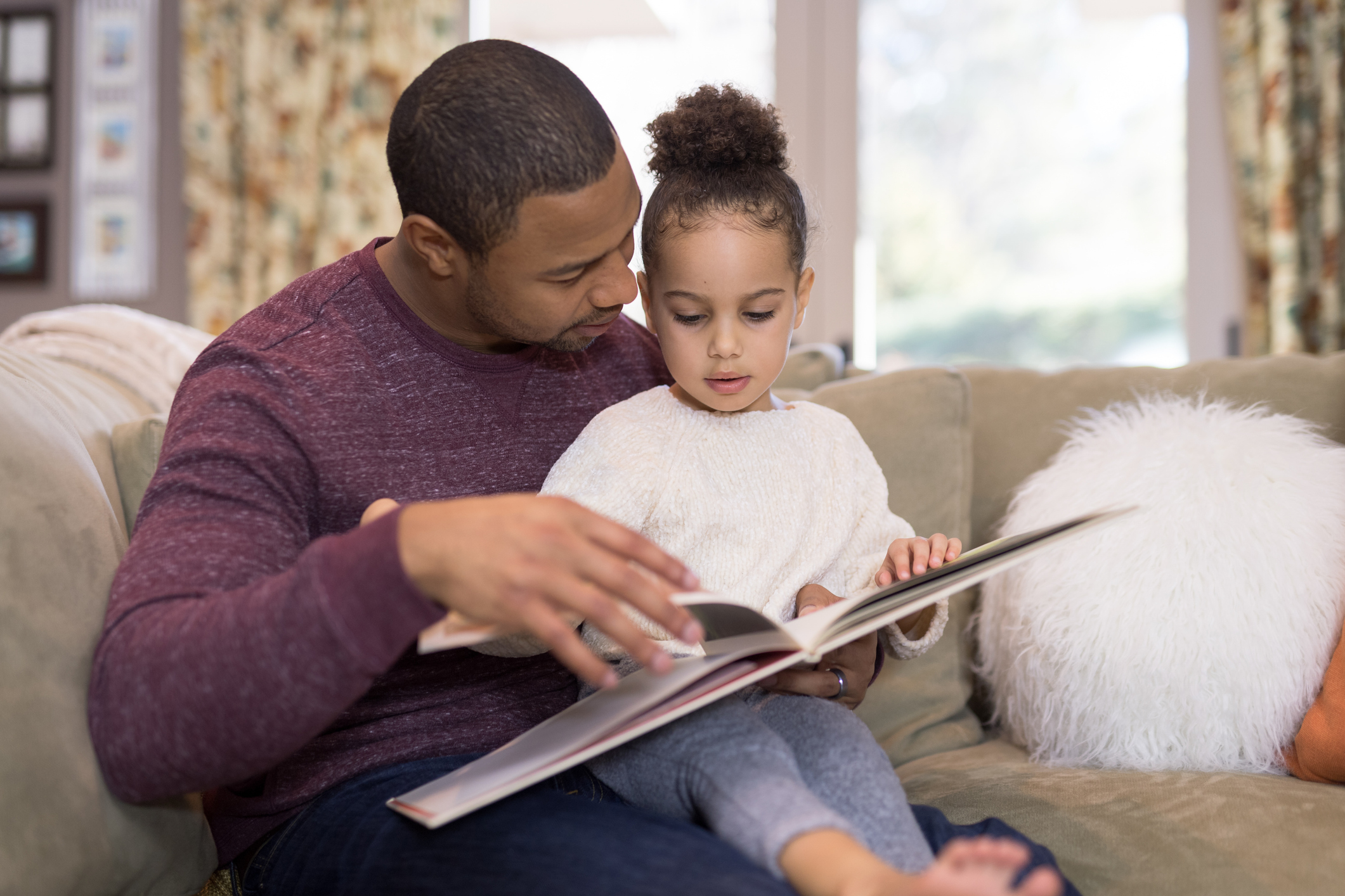 Father and daughter reading